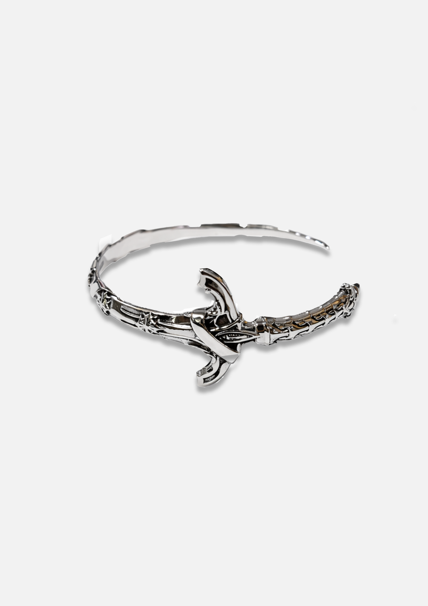 OXALIS ARC SWORD BANGLE IN STERLING SILVER