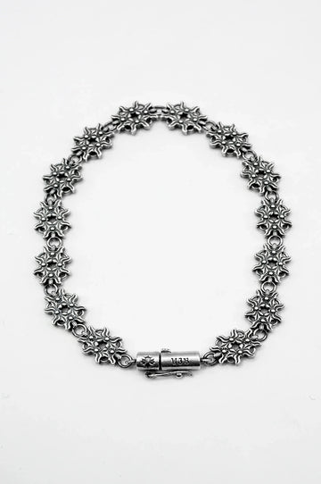 FLORAL VERTEBRAE BRACELET IN STERLING SILVER - Youths In Balaclava